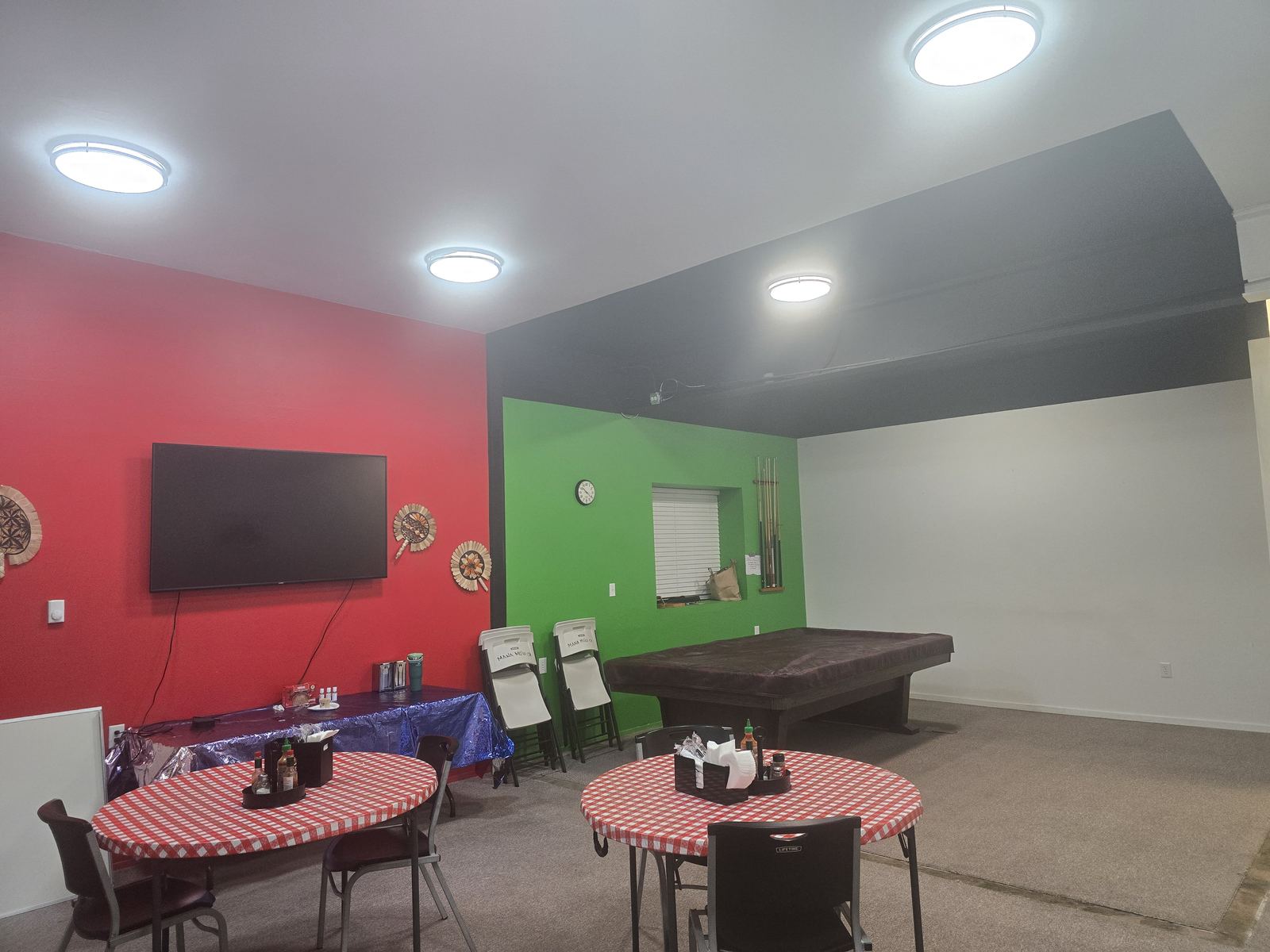 Poly Eats pool table and TV dining area
